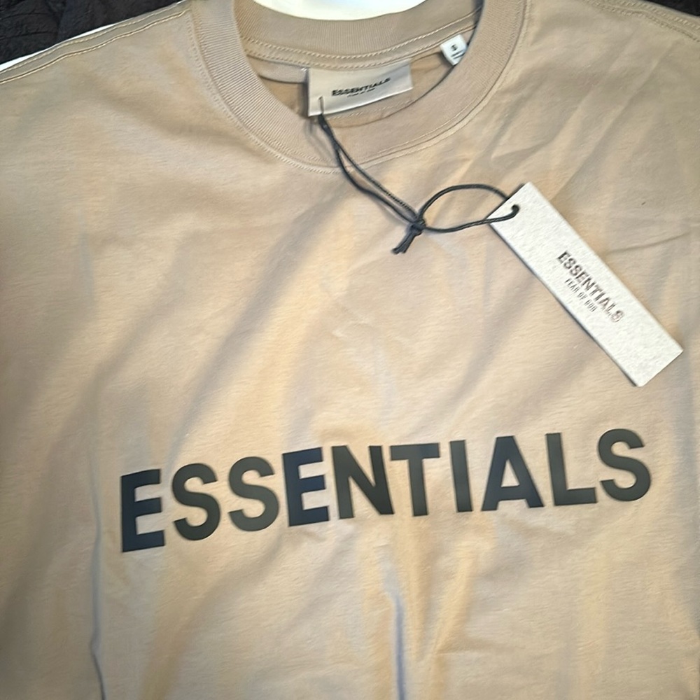 Essentials  T-shirt with tags & bag